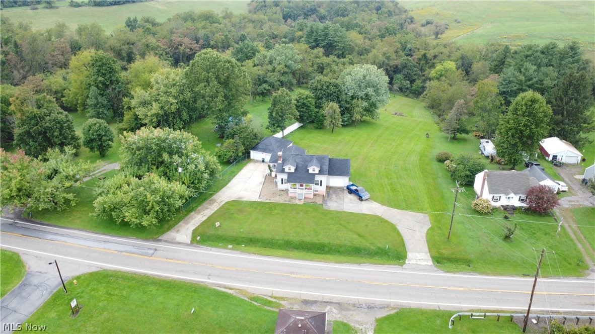 72622 Colerain Road Dillonvale, OH 43917 - Photo 2 of 17 White exterior with dark roof