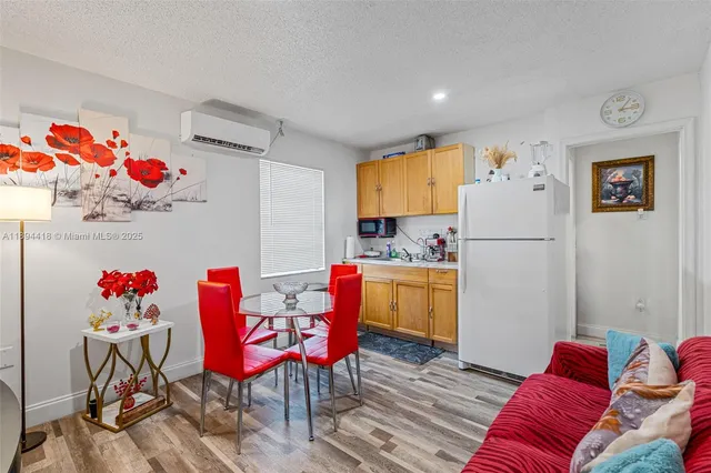 a bed room with a bed and a chair