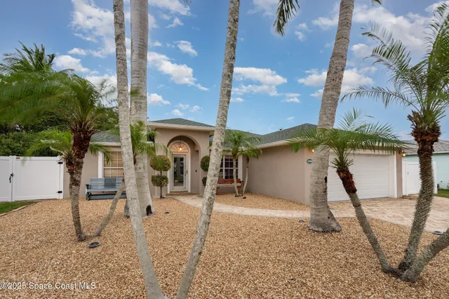 a house view with a backyard space