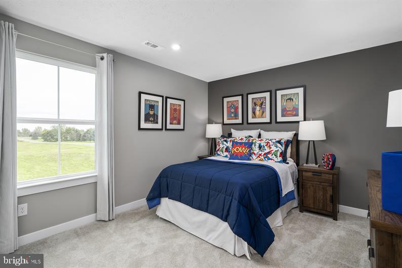 3422 Fox Pointe Lane York, PA 17404 - Photo 24 of 27 a bedroom with a bed and a window