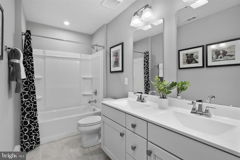 3422 Fox Pointe Lane York, PA 17404 - Photo 27 of 27 a bathroom with a sink a toilet a tub and shower