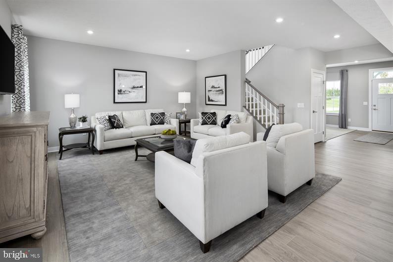 3422 Fox Pointe Lane York, PA 17404 - Photo 5 of 27 a living room with furniture and a flat screen tv