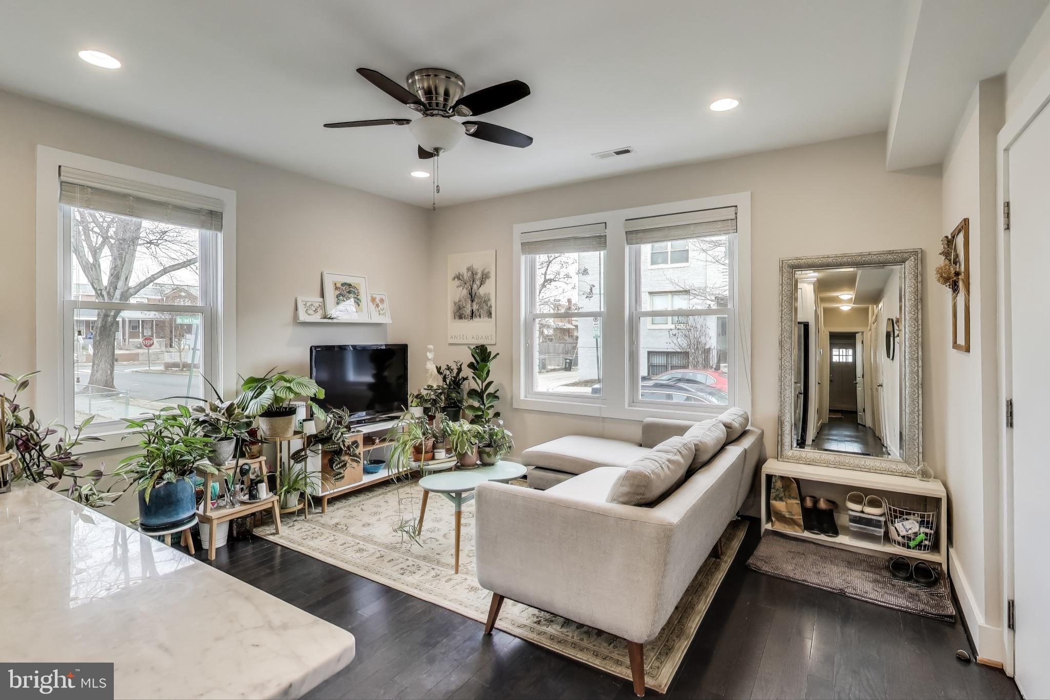 426 18th Street Northeast, Unit 2 Washington, DC 20002 - Photo 3 of 20 a living room with furniture and a large window