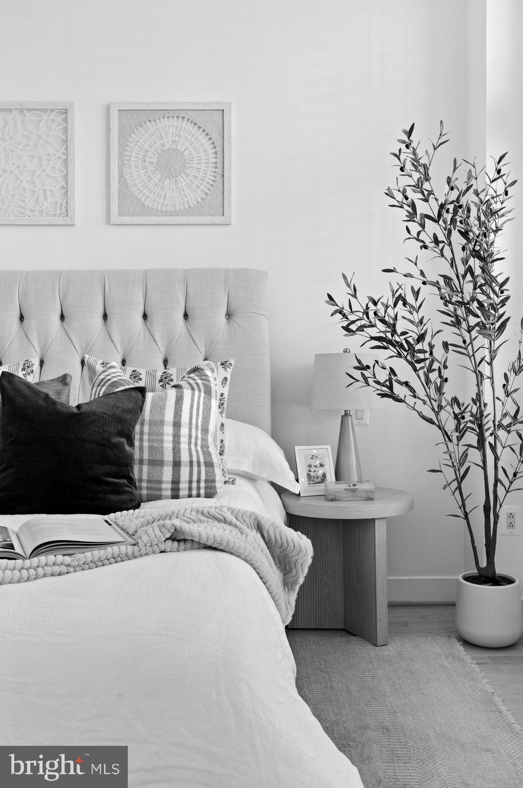 2425 L Street Northwest, Unit 620 Washington, DC 20037 - Photo 15 of 35 a living room with furniture and flowers