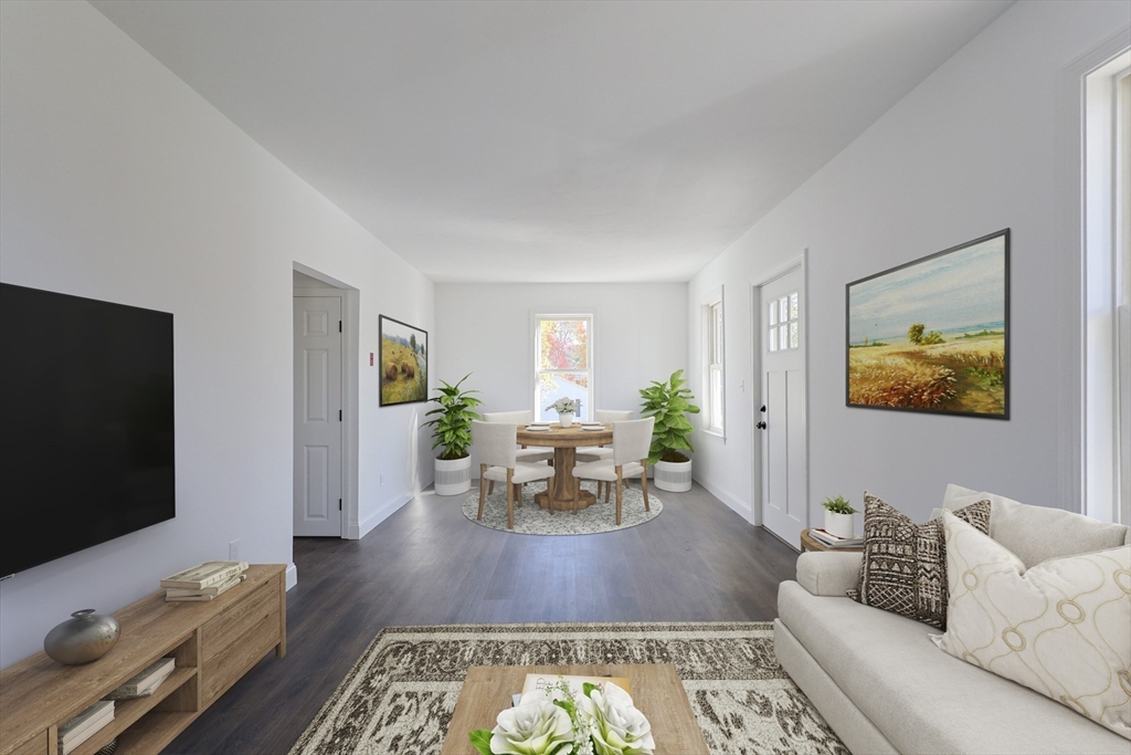 21 Irving Street Bellingham, MA 02019 - Photo 18 of 39 a living room with furniture and a flat screen tv