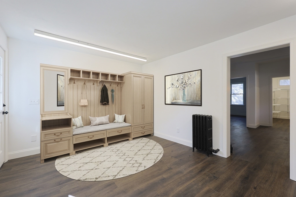 21 Irving Street Bellingham, MA 02019 - Photo 20 of 39 a view of livingroom with furniture and wooden floor