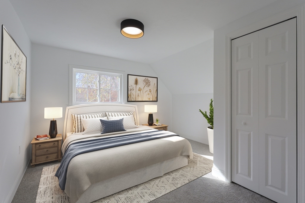 21 Irving Street Bellingham, MA 02019 - Photo 31 of 39 a bedroom with a bed and a window