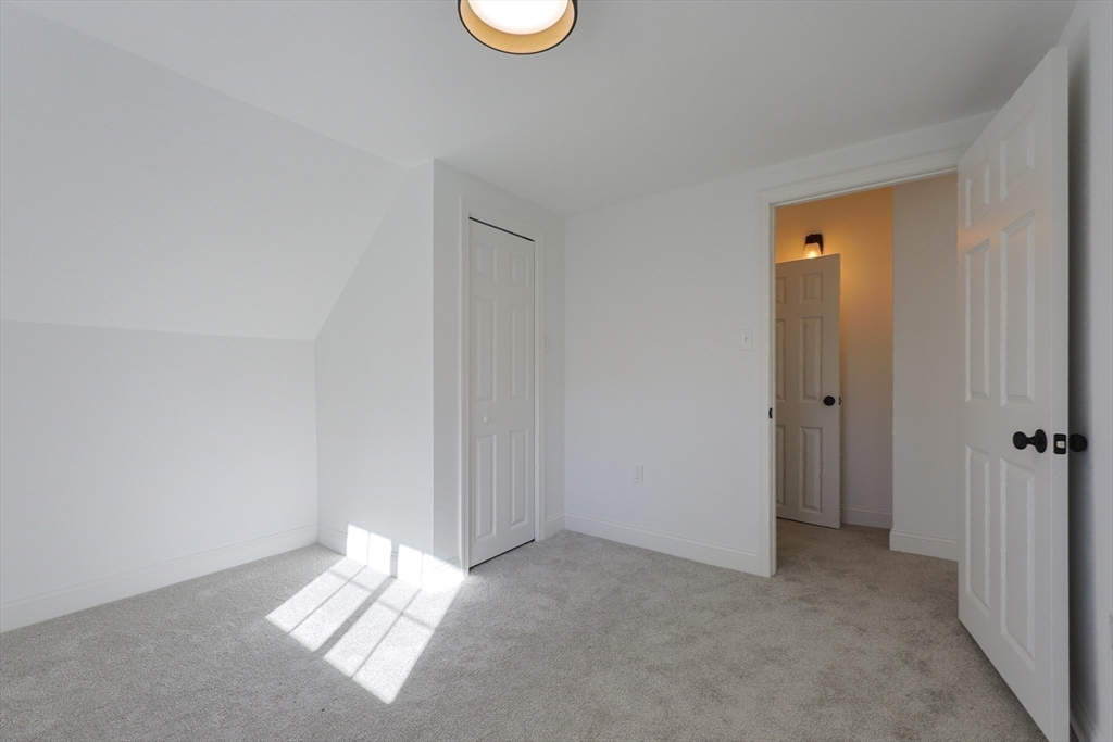 21 Irving Street Bellingham, MA 02019 - Photo 33 of 39 a view of a room with wooden floor and sink
