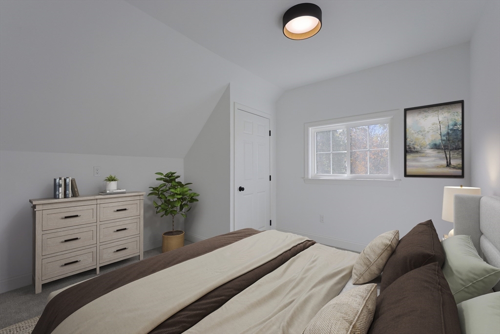 21 Irving Street Bellingham, MA 02019 - Photo 34 of 39 a bedroom with a bed and with furniture