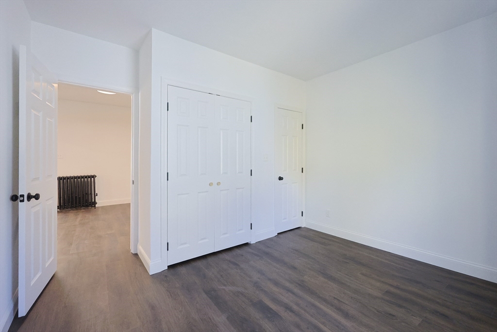 21 Irving Street Bellingham, MA 02019 - Photo 37 of 39 a view of a room with wooden floor