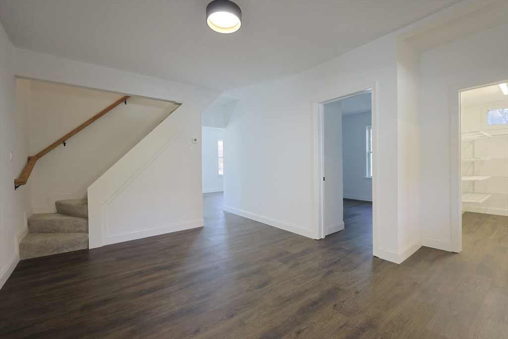 21 Irving Street Bellingham, MA 02019 - Photo 7 of 39 a view of a livingroom with wooden floor