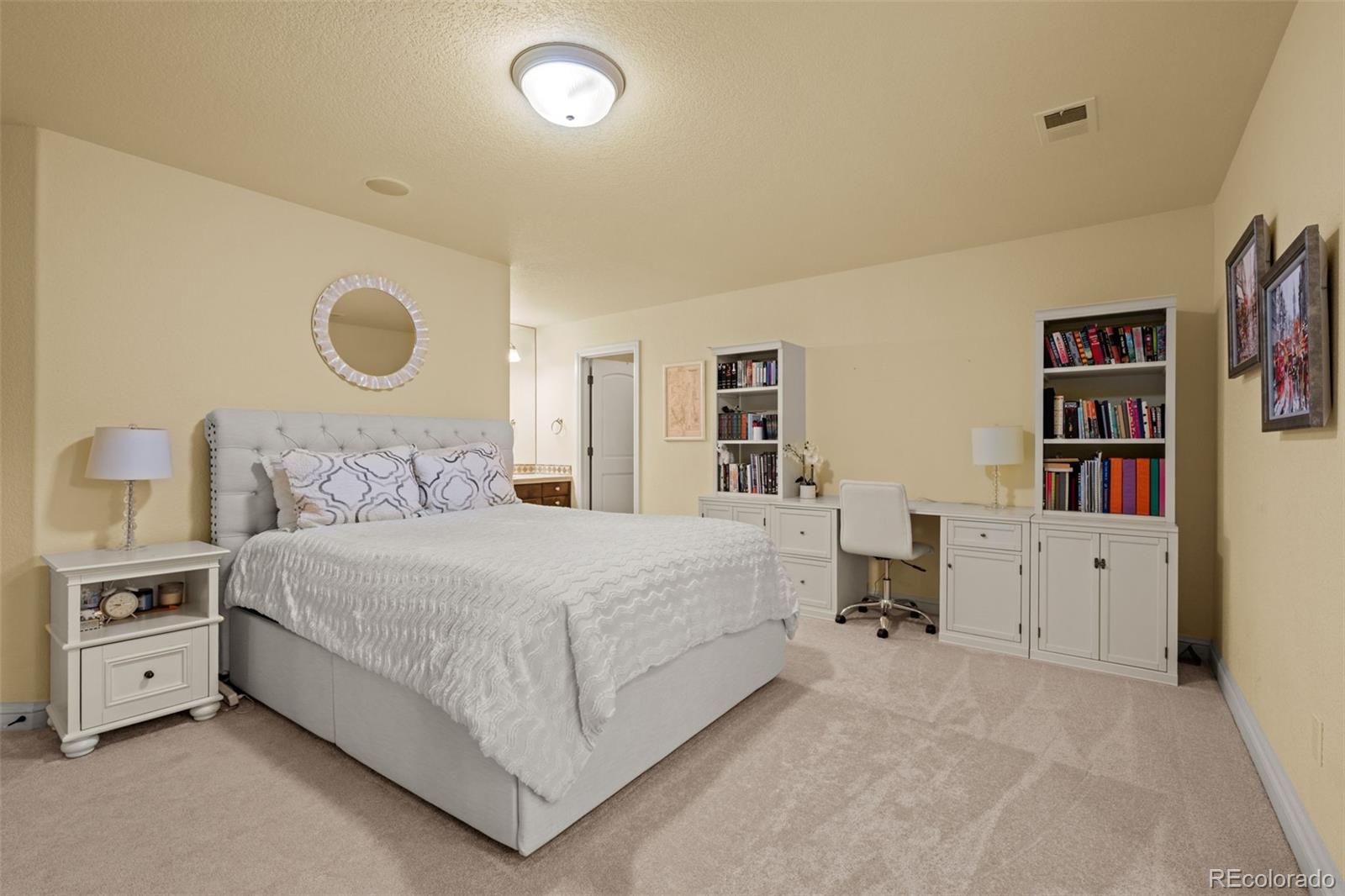 5 Redhawk Run Cherry Hills Village, CO 80113 - Photo 21 of 35 a large white bed in a white room