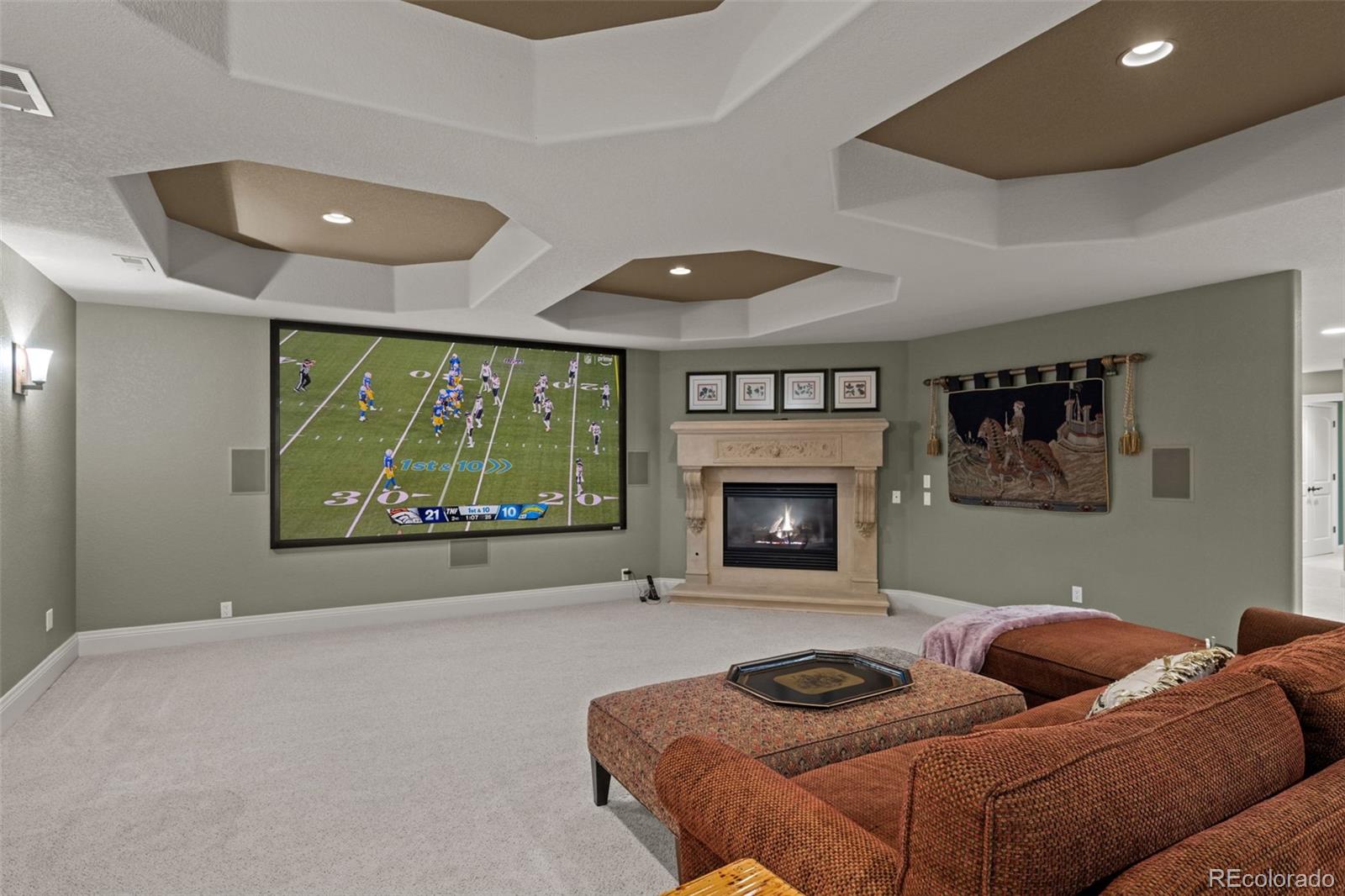 5 Redhawk Run Cherry Hills Village, CO 80113 - Photo 25 of 35 a living room with furniture and a flat screen tv