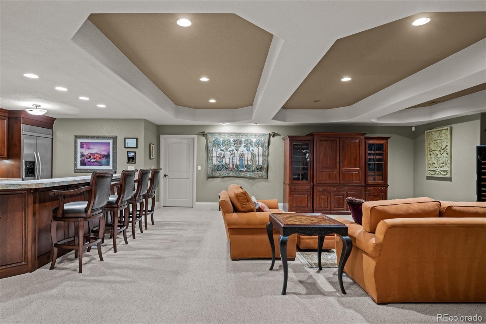 5 Redhawk Run Cherry Hills Village, CO 80113 - Photo 26 of 35 a living room with furniture and a large window