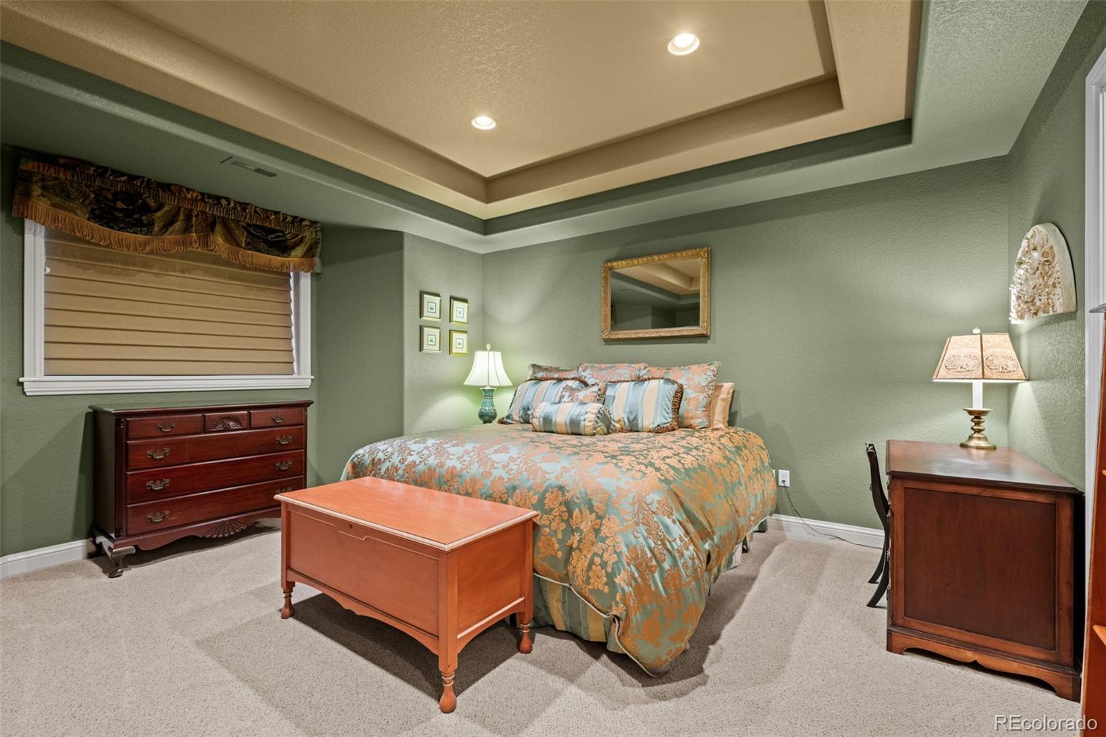 5 Redhawk Run Cherry Hills Village, CO 80113 - Photo 28 of 35 a bedroom with a bed and a dresser