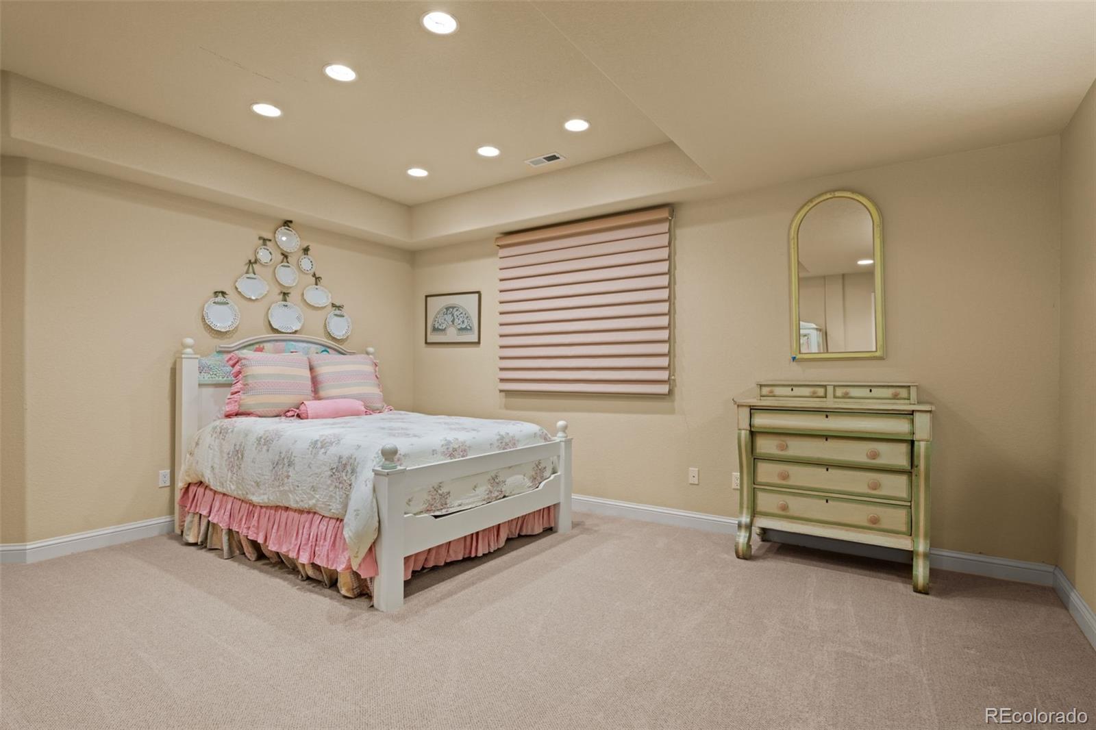 5 Redhawk Run Cherry Hills Village, CO 80113 - Photo 29 of 35 a bedroom with a bed and a window