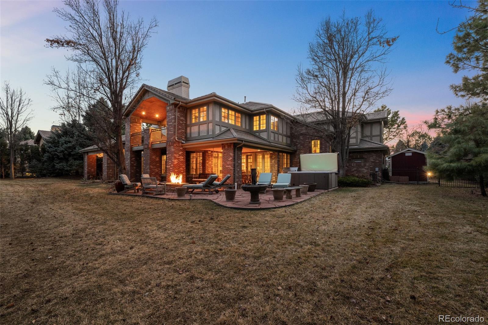 5 Redhawk Run Cherry Hills Village, CO 80113 - Photo 33 of 35 a view of a house with a yard
