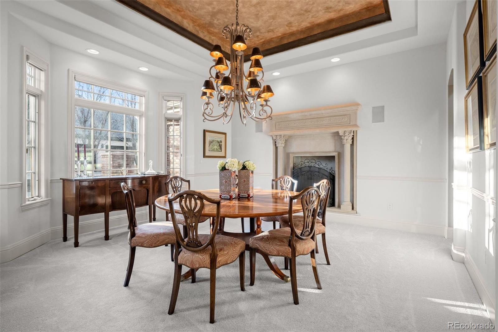 5 Redhawk Run Cherry Hills Village, CO 80113 - Photo 5 of 35 a view of a dining room with furniture window and outside view
