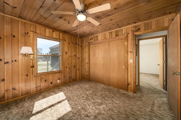 a view of an empty room and window