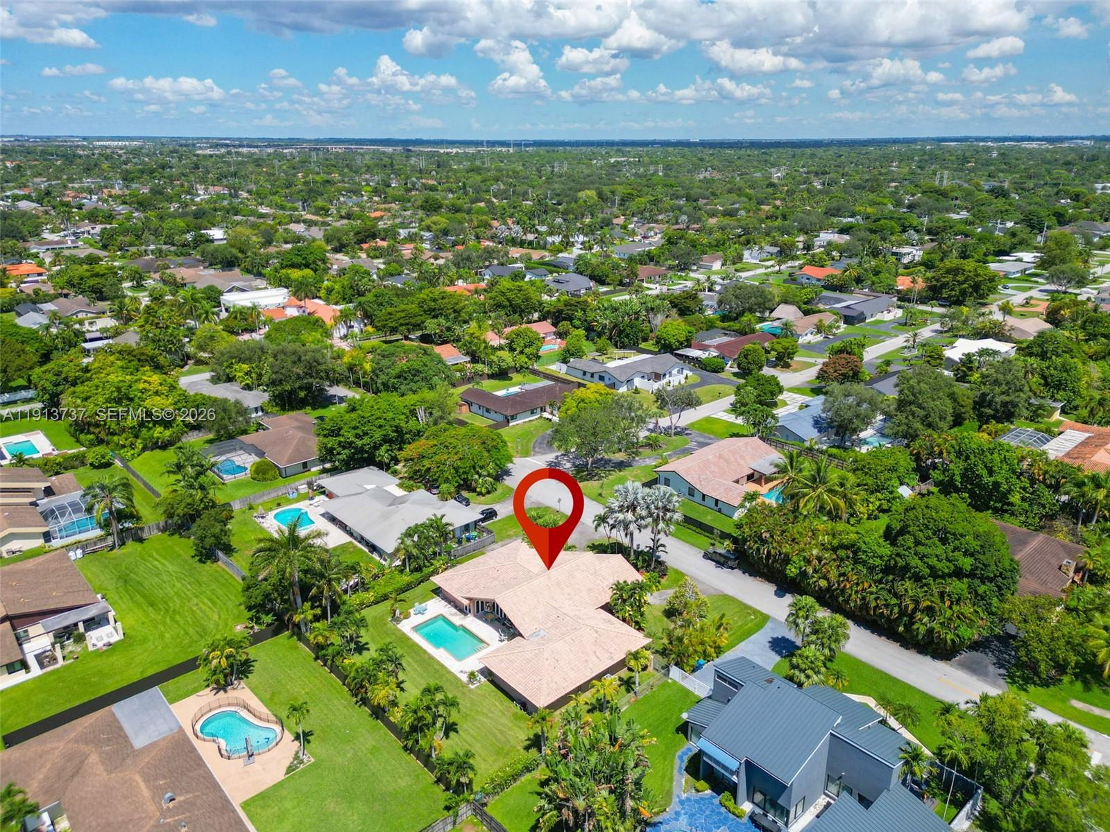 10220 Southwest 140th Street Miami, FL 33176 - Photo 46 of 53 an aerial view of residential houses with outdoor space and swimming pool