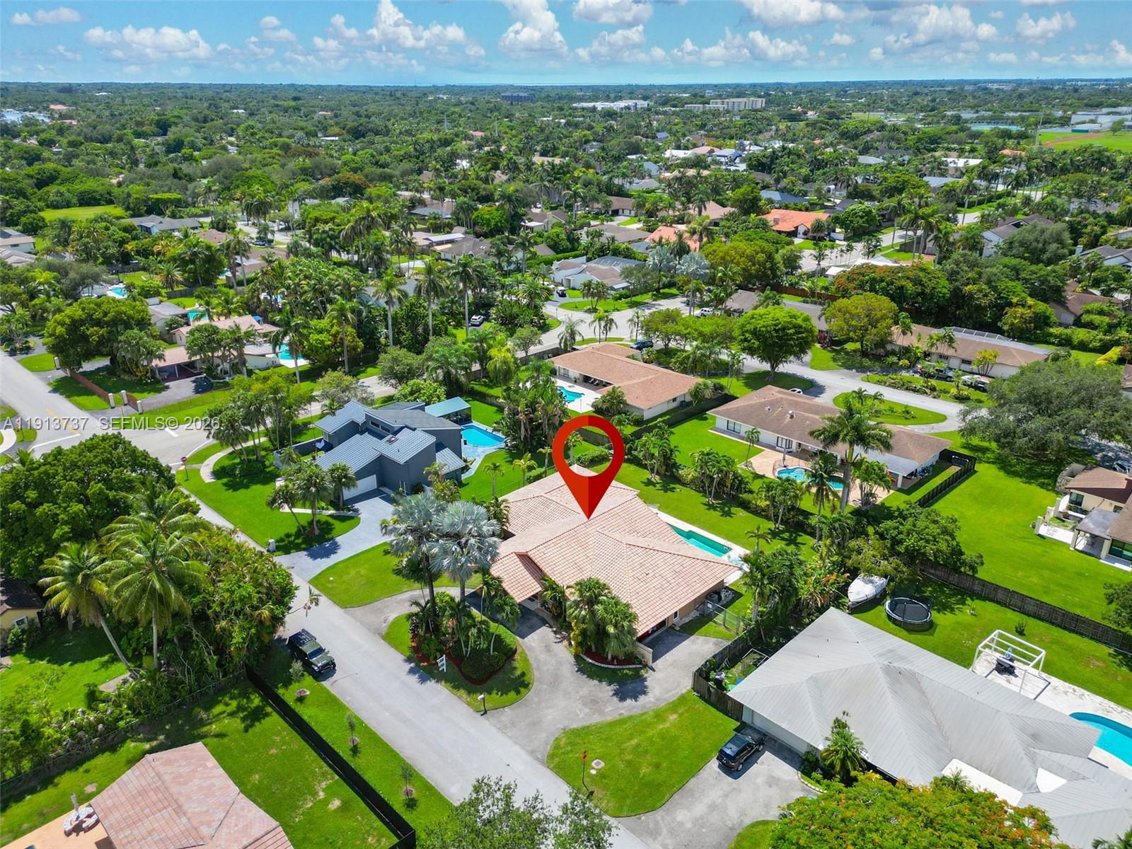 10220 Southwest 140th Street Miami, FL 33176 - Photo 50 of 53 an aerial view of residential houses with outdoor space and trees