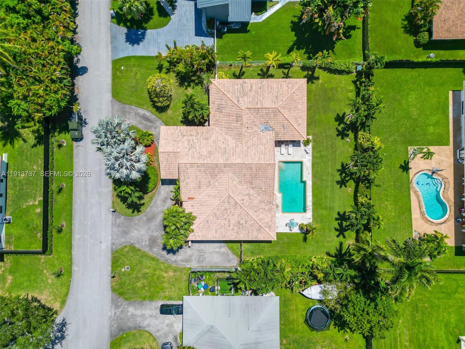 10220 Southwest 140th Street Miami, FL 33176 - Photo 53 of 53 an aerial view of a house with a garden