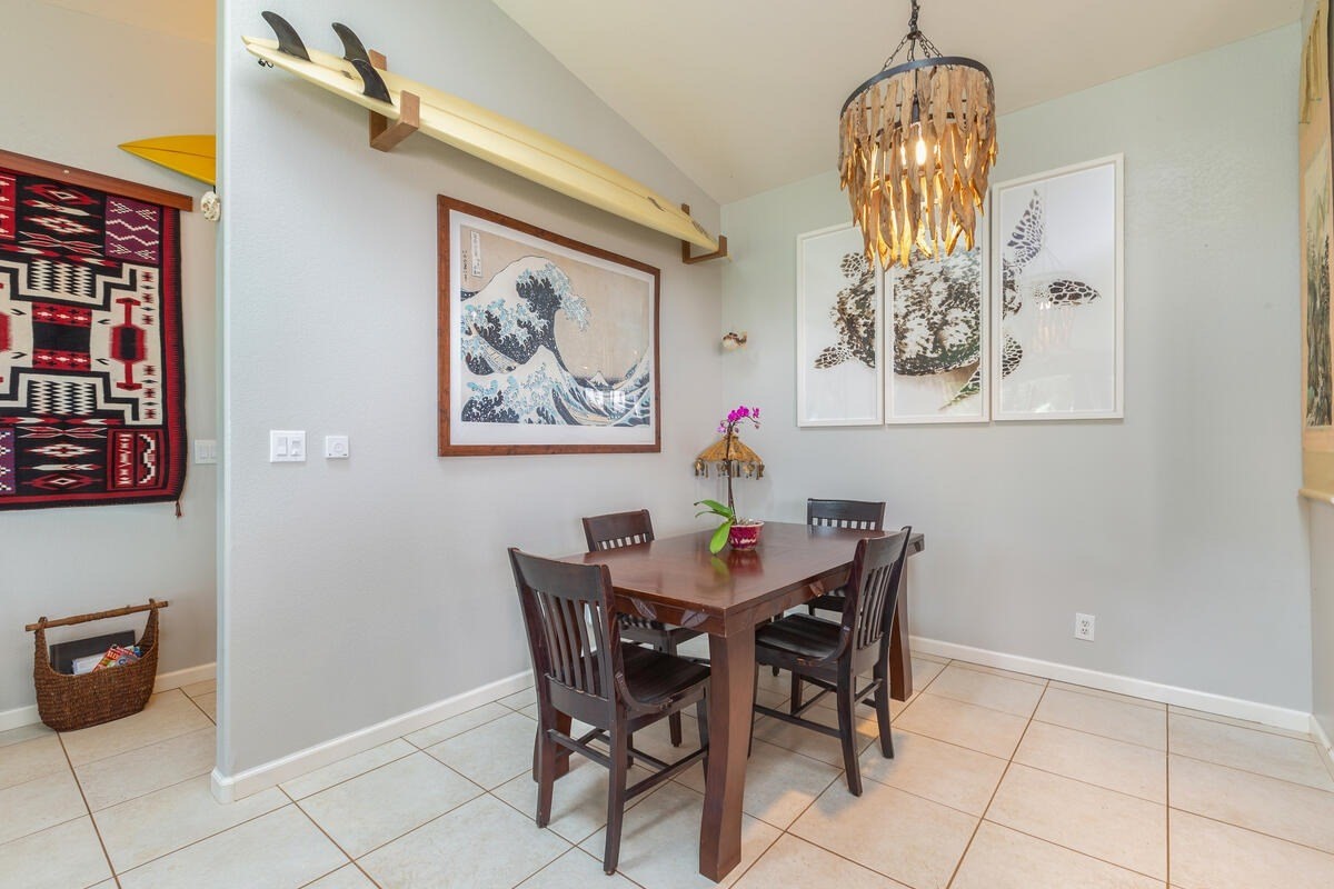 4845 Ohu Road Kapaa, HI 96746 - Photo 4 of 13 a view of a dining room with furniture and chandelier