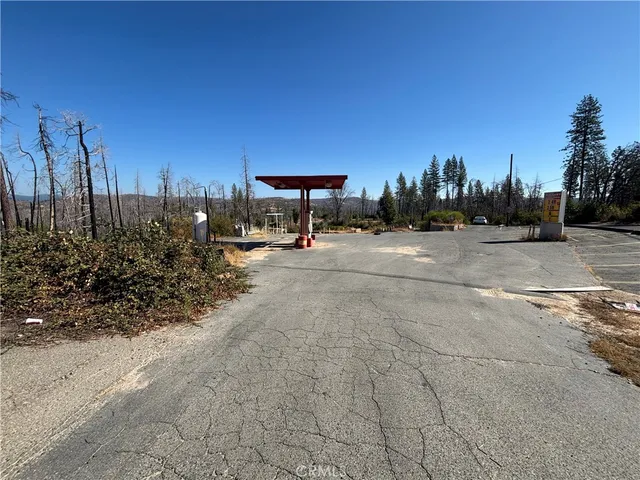 a view of a street with an outdoor space