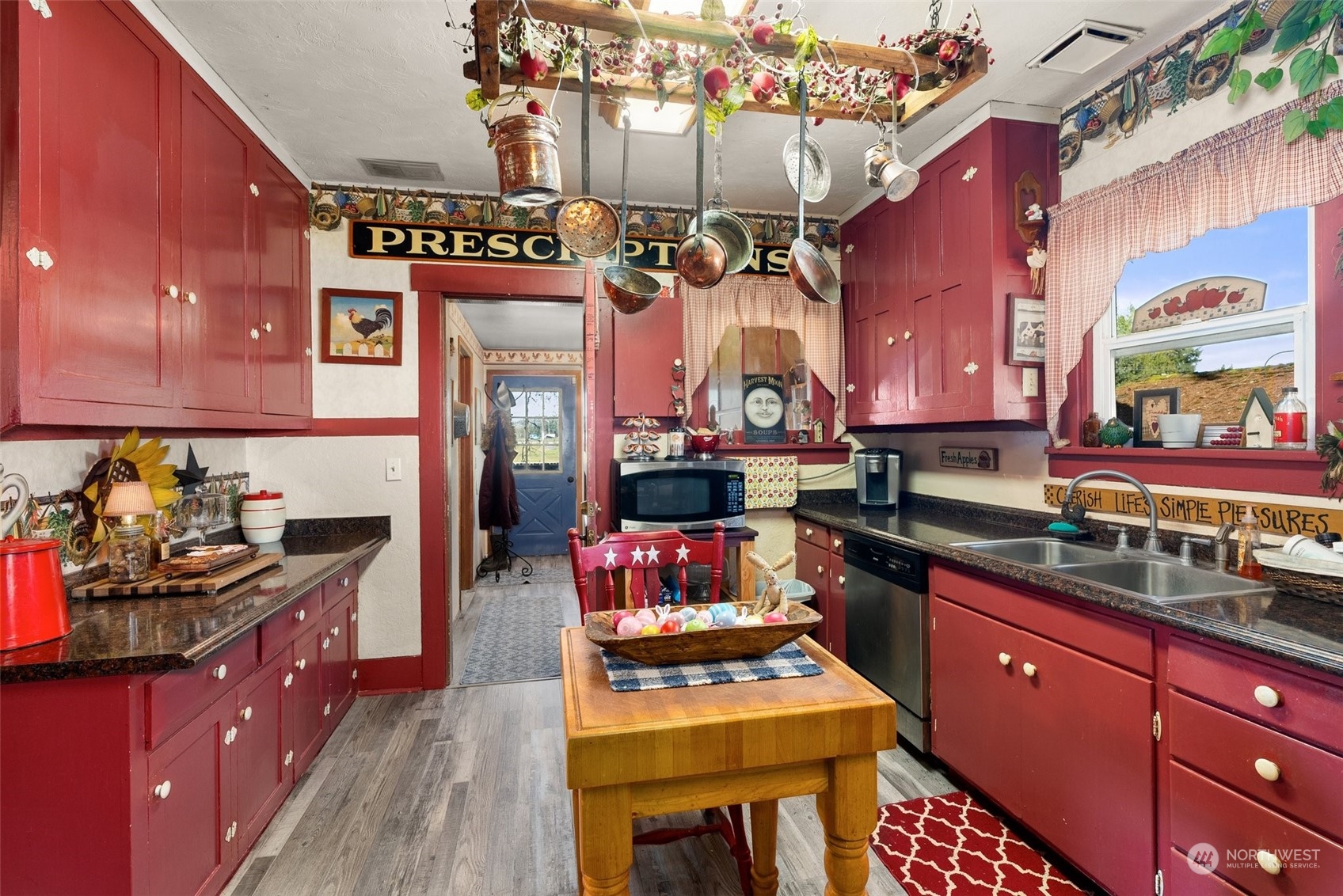 809 Long Road Centralia, WA 98531 - Photo 11 of 37 a kitchen with stainless steel appliances a sink stove and cabinets