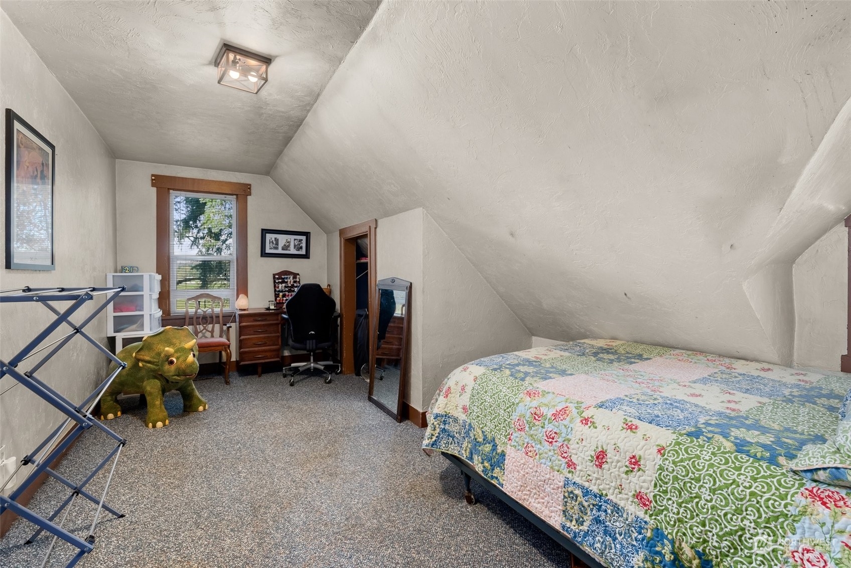 809 Long Road Centralia, WA 98531 - Photo 17 of 37 a bedroom with bed and a large window