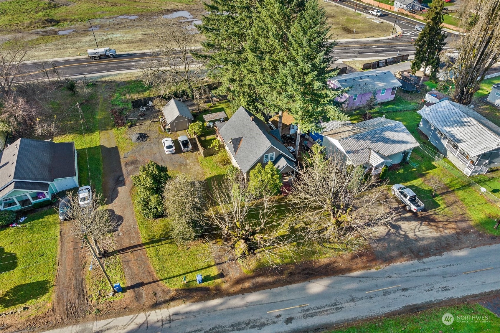 809 Long Road Centralia, WA 98531 - Photo 33 of 37 a aerial view of a house with a yard and lake view