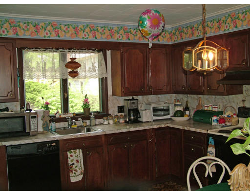 66 Garfield Street Springfield, MA 01108 - Photo 7 of 12 a kitchen with a sink cabinets and window