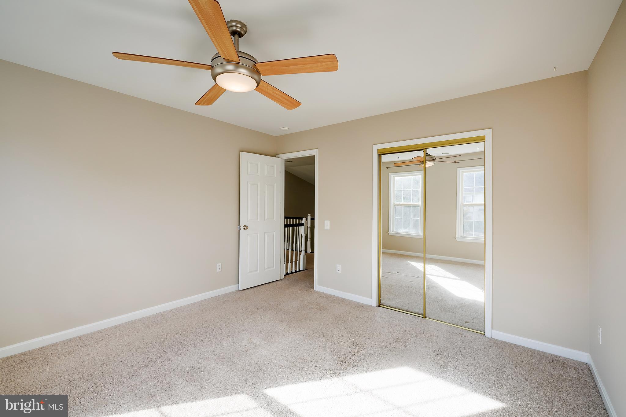 7428 Quail Ridge Lane Bowie, MD 20720 - Photo 38 of 87 a view of an empty room and a ceiling fan