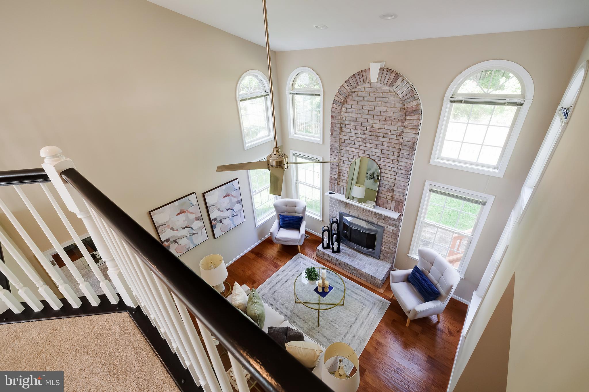 7428 Quail Ridge Lane Bowie, MD 20720 - Photo 41 of 87 a living room with furniture and a large window