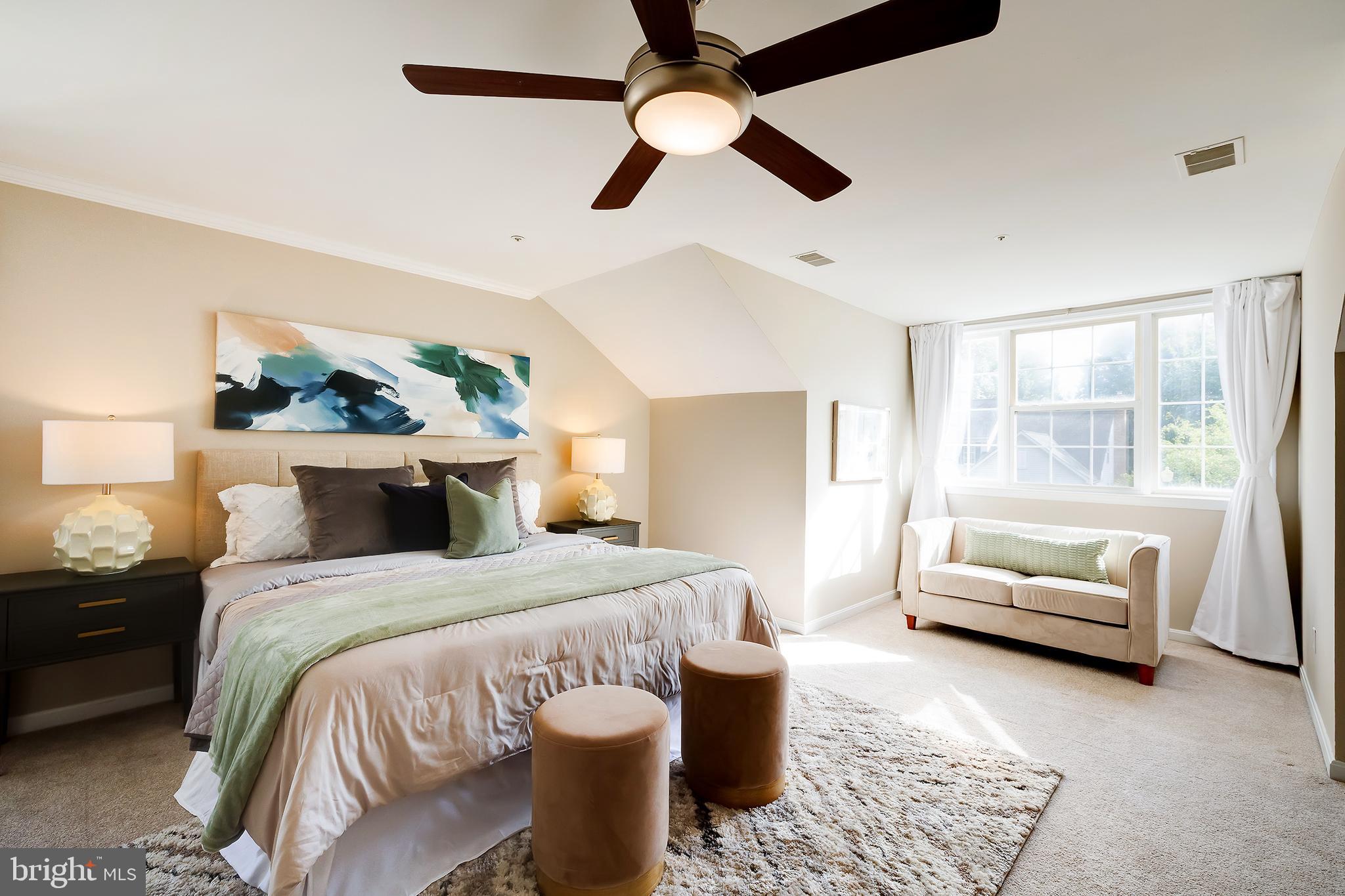 7428 Quail Ridge Lane Bowie, MD 20720 - Photo 43 of 87 a bedroom with a bed couch and a window