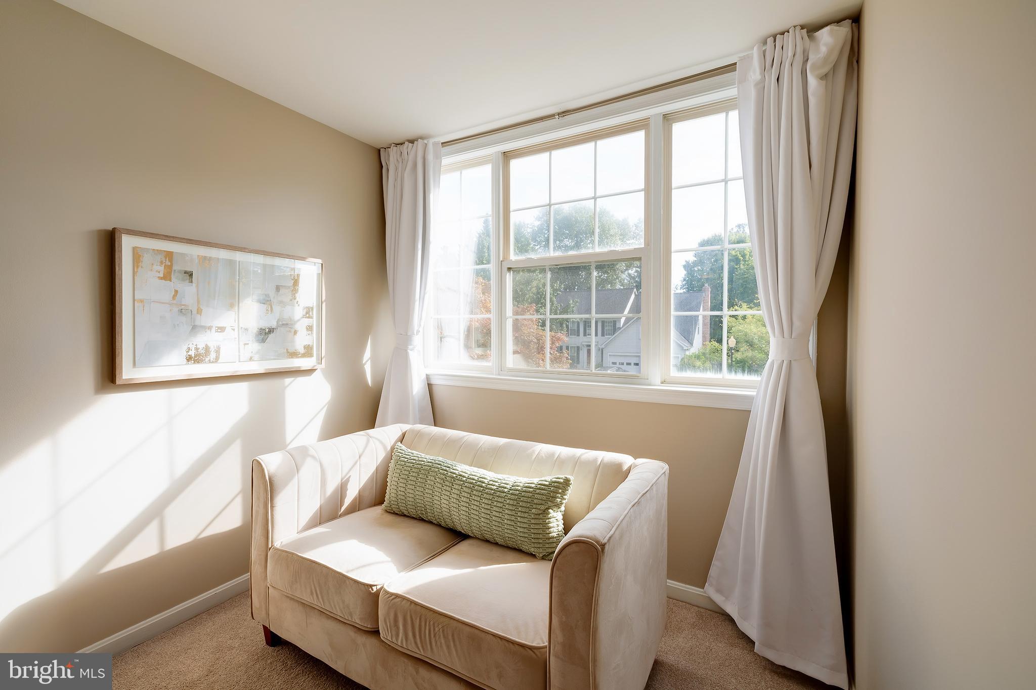 7428 Quail Ridge Lane Bowie, MD 20720 - Photo 45 of 87 a living room with furniture and a window