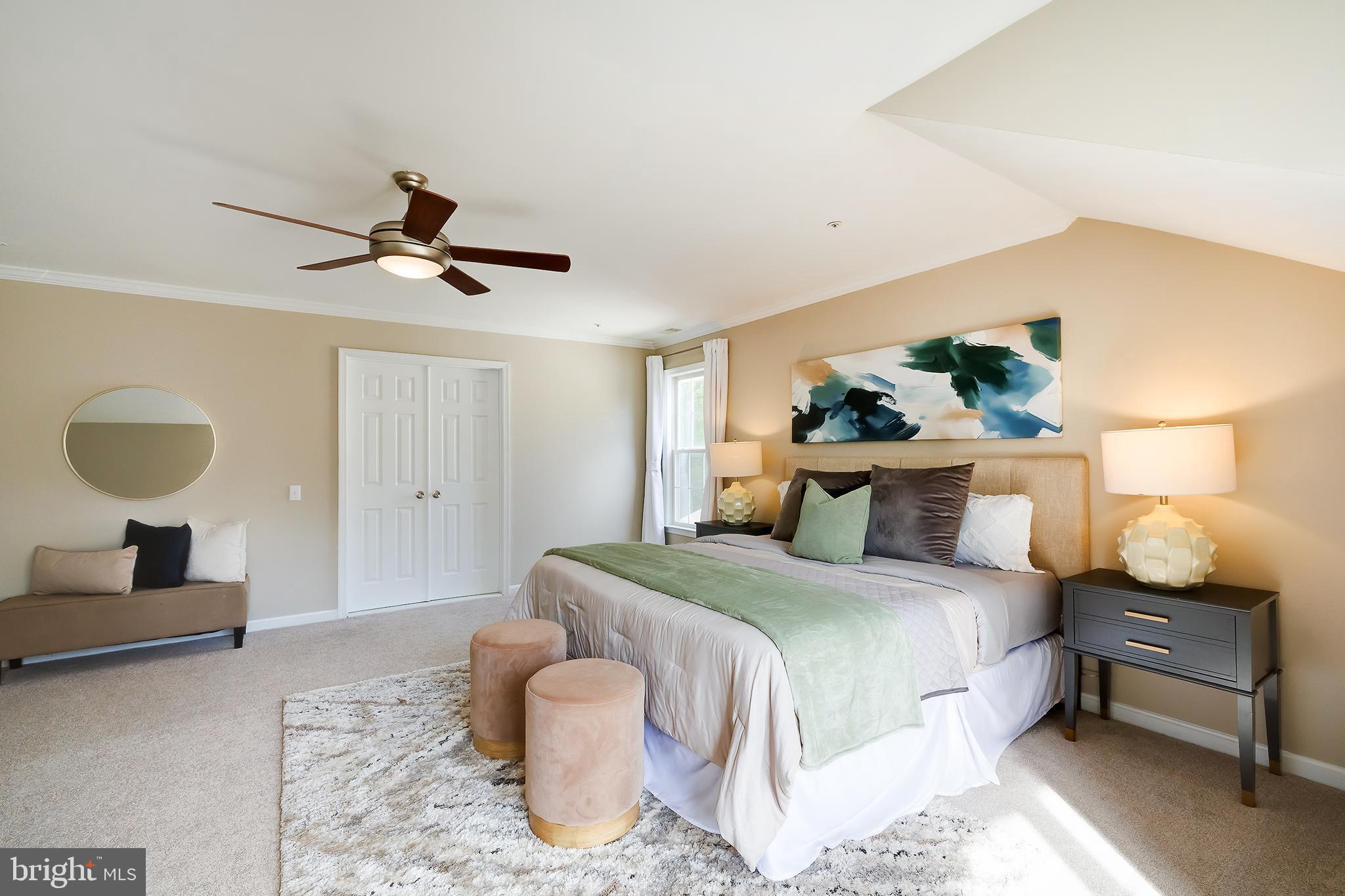 7428 Quail Ridge Lane Bowie, MD 20720 - Photo 46 of 87 a bedroom with a bed and a painting on the wall