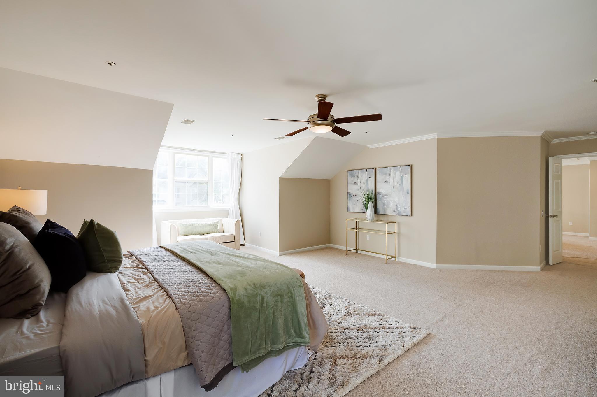 7428 Quail Ridge Lane Bowie, MD 20720 - Photo 48 of 87 a bedroom with a bed and a window