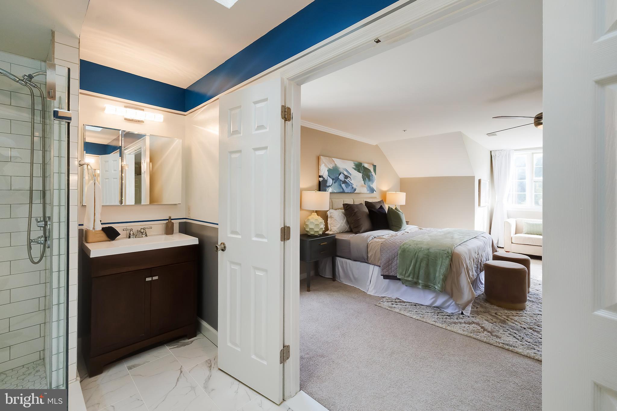 7428 Quail Ridge Lane Bowie, MD 20720 - Photo 54 of 87 a spacious bedroom with a bed and a dresser