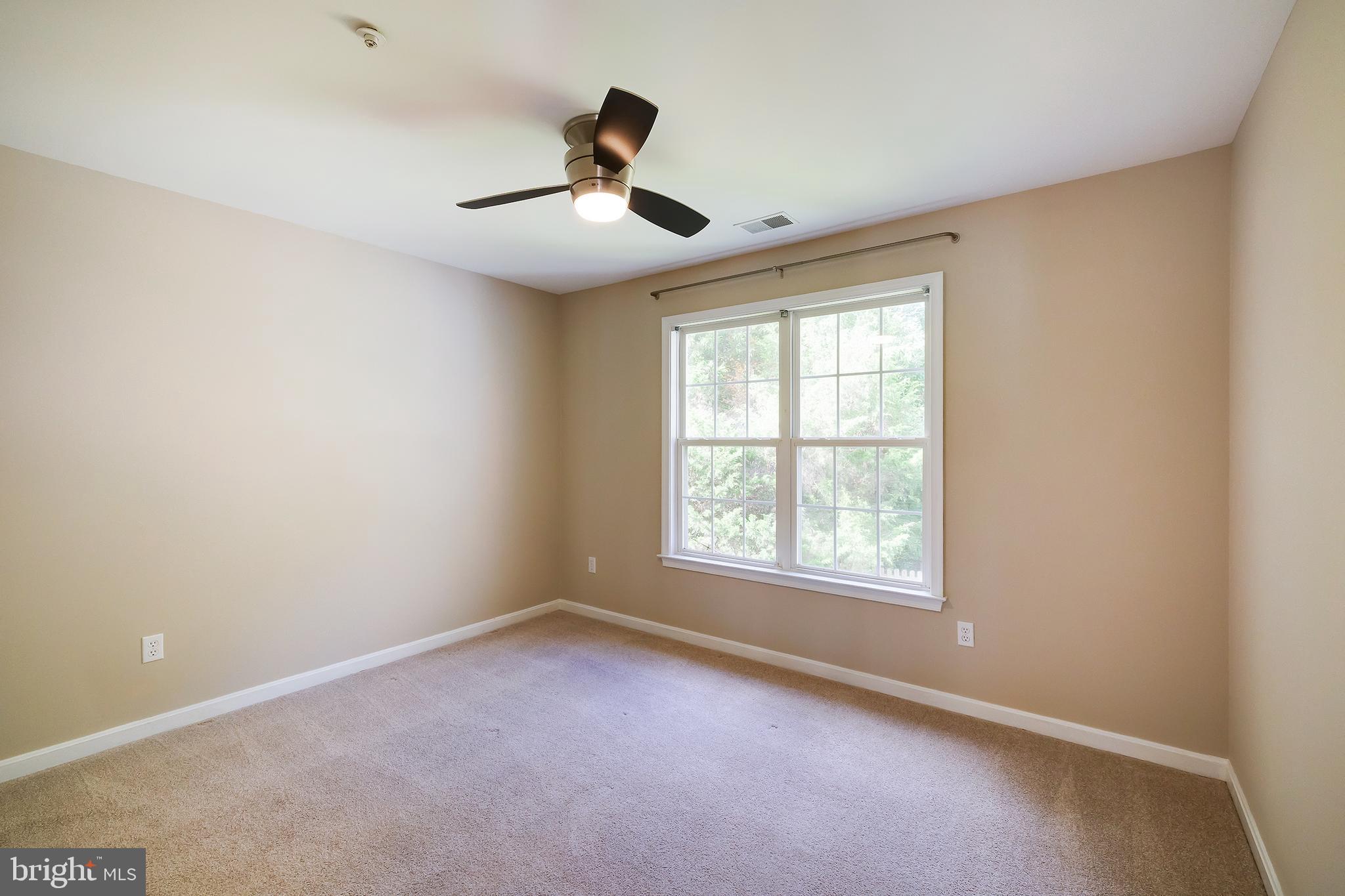 7428 Quail Ridge Lane Bowie, MD 20720 - Photo 60 of 87 a view of an empty room with a window