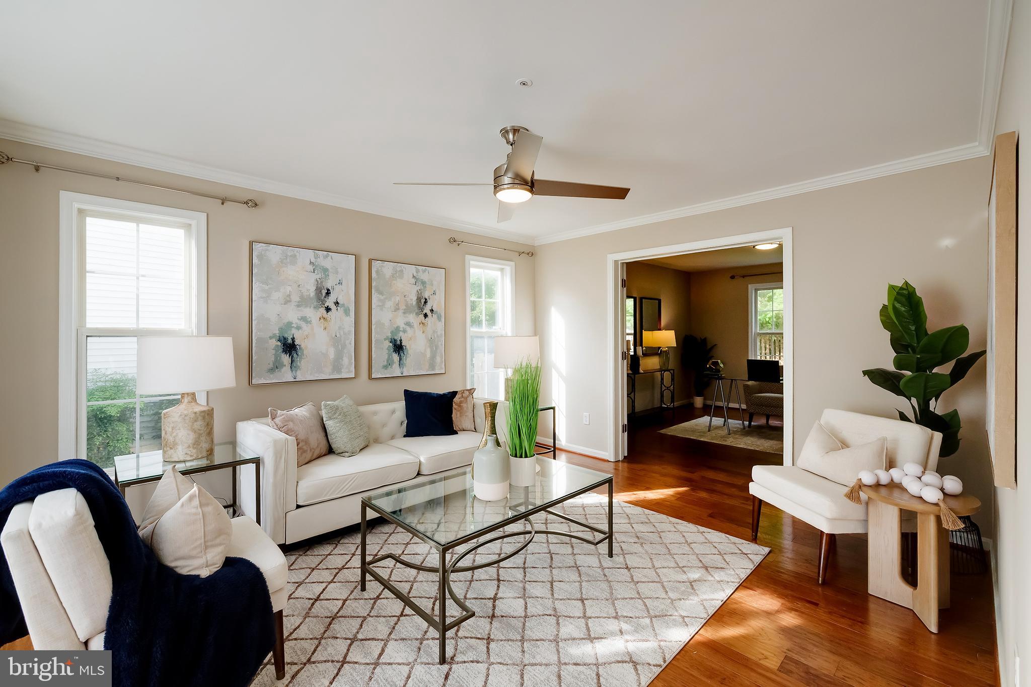 7428 Quail Ridge Lane Bowie, MD 20720 - Photo 7 of 87 a living room with furniture and wooden floor