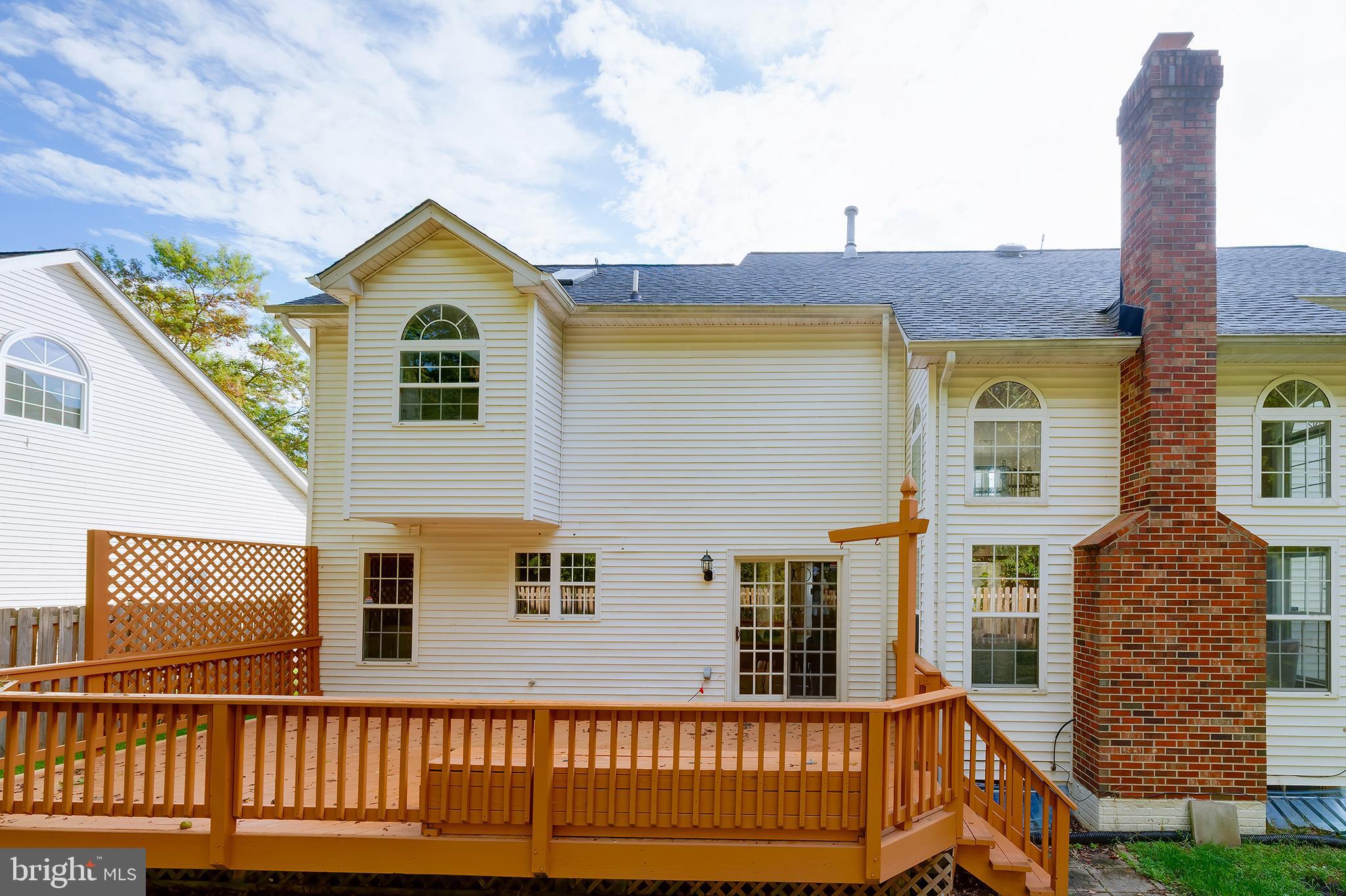 7428 Quail Ridge Lane Bowie, MD 20720 - Photo 78 of 87 a front view of a house with a yard