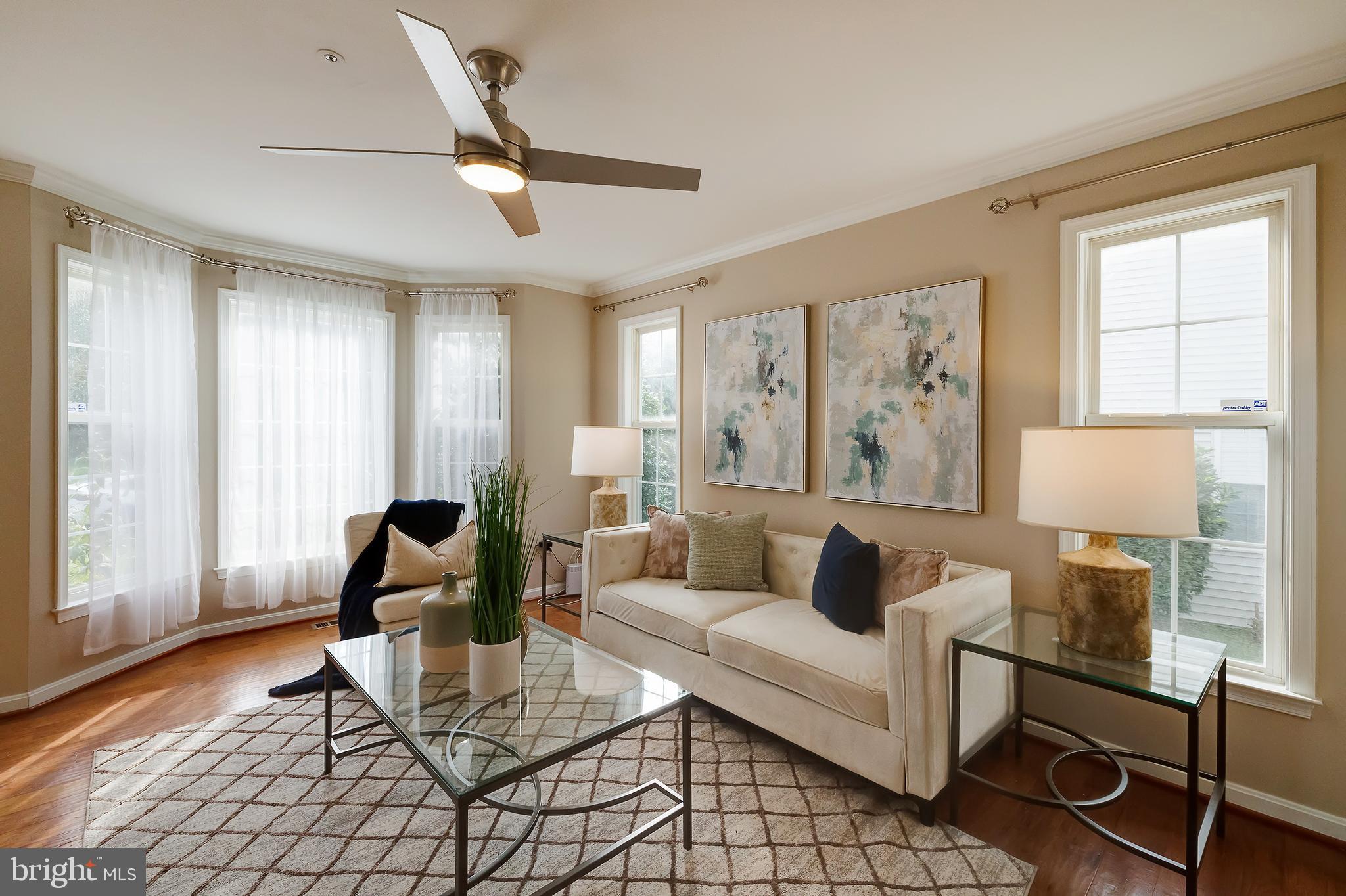 7428 Quail Ridge Lane Bowie, MD 20720 - Photo 8 of 87 a living room with furniture and a window