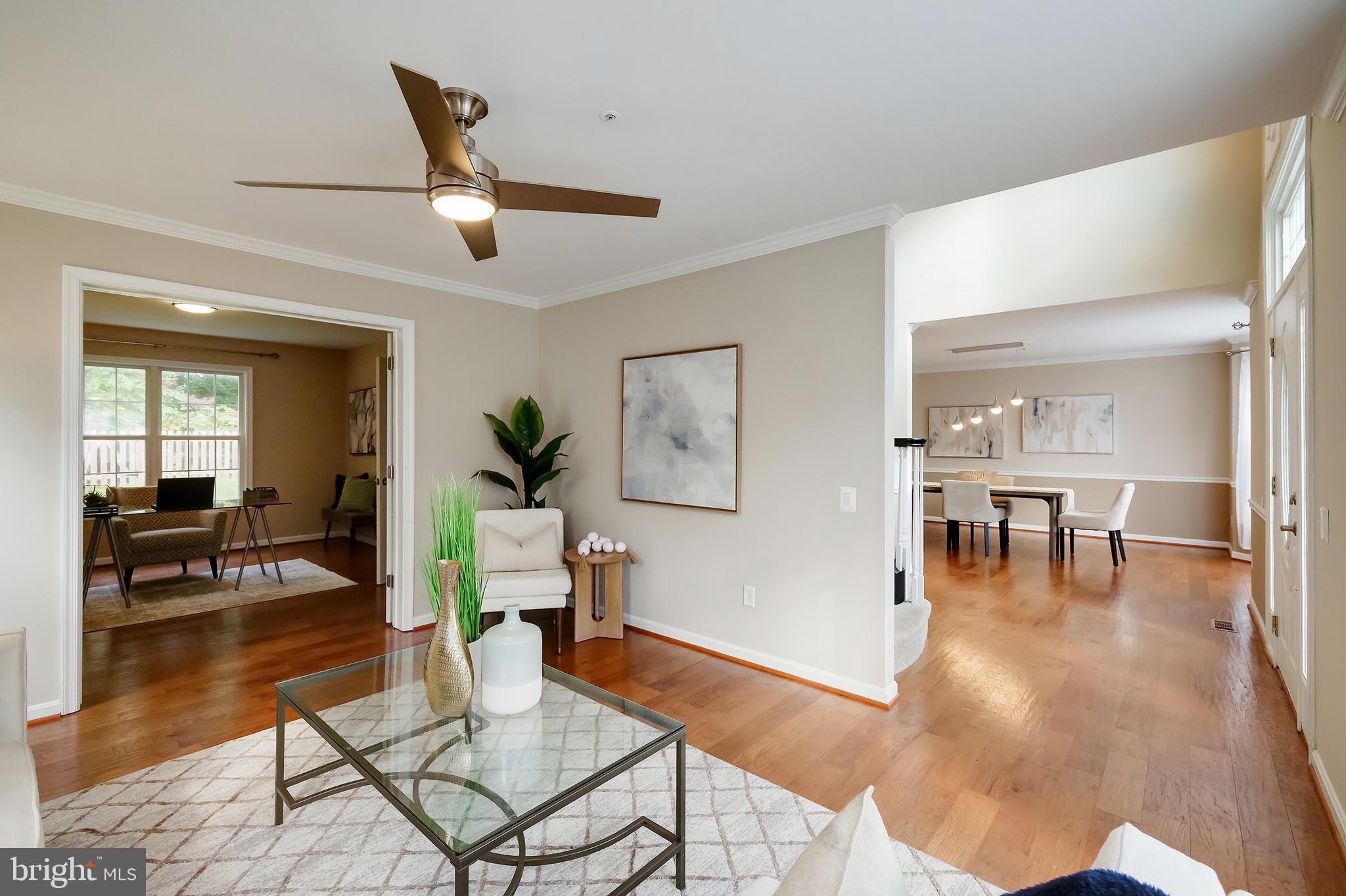 7428 Quail Ridge Lane Bowie, MD 20720 - Photo 10 of 87 a living room with furniture and wooden floor