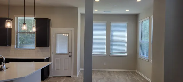 a bathroom with a bathtub and a sink