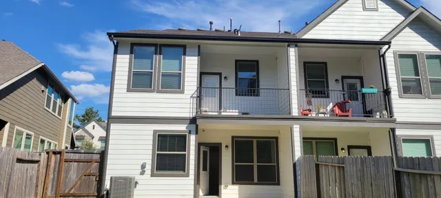 a view of a building with a window and balcony