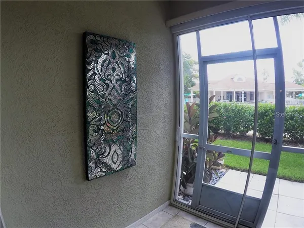 a view of a floor to ceiling window with a door