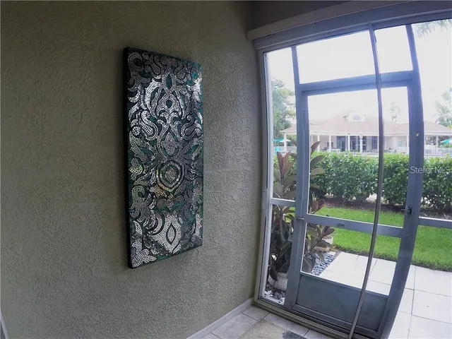 a view of a floor to ceiling window with a door