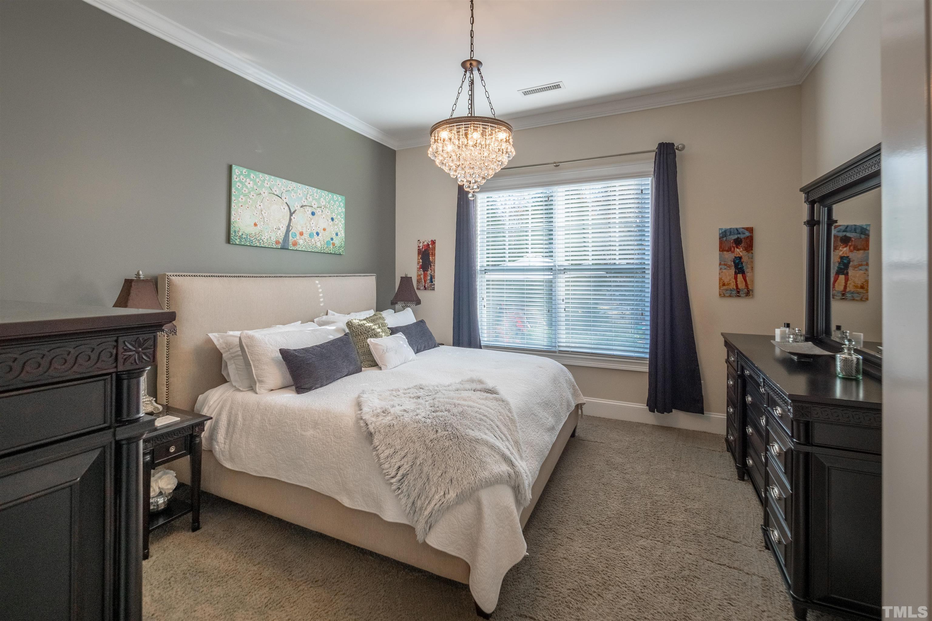 789 Fallon Grove Way Raleigh, NC 27608 - Photo 12 of 29 a bedroom with bed and a window