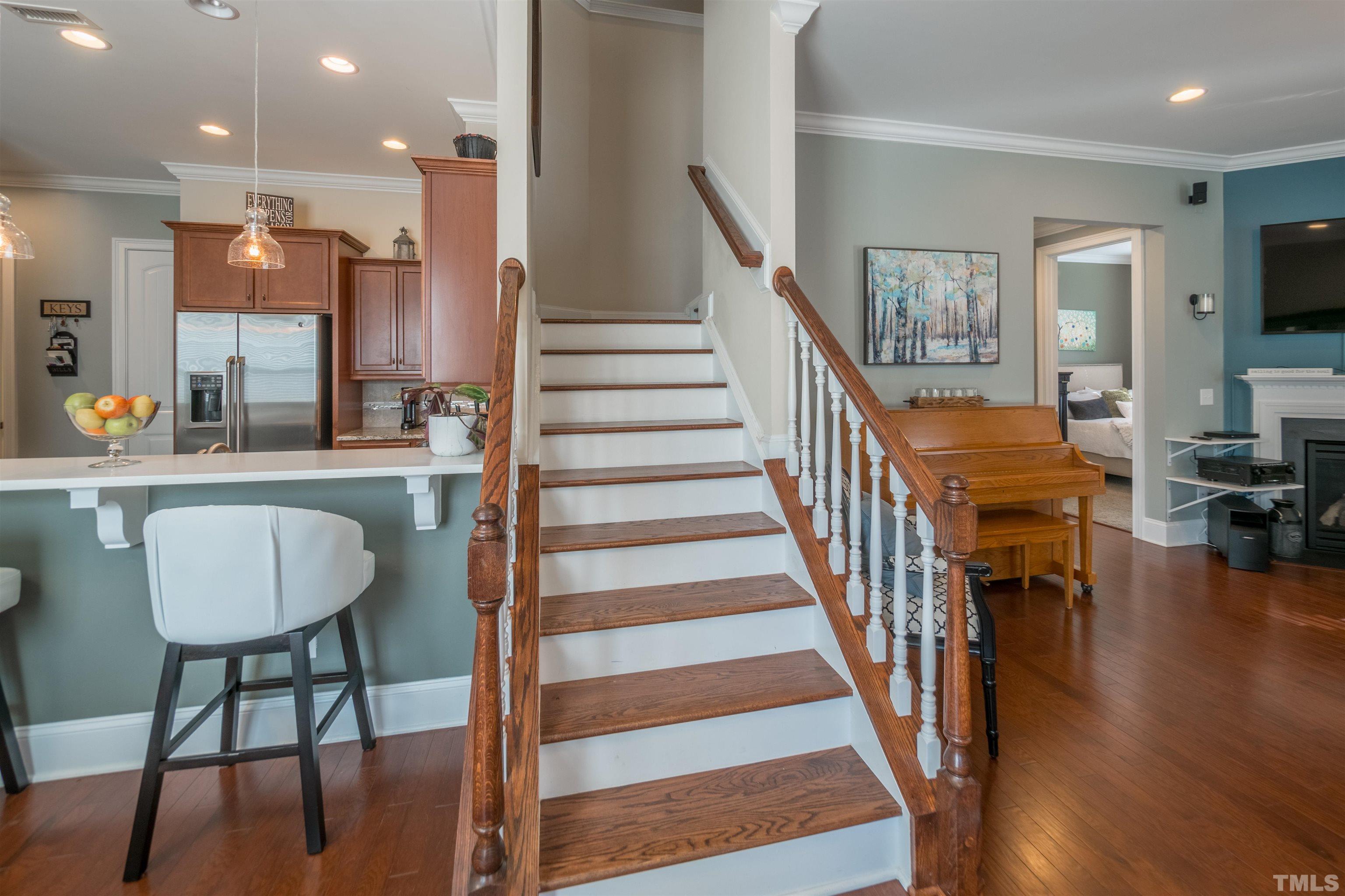 789 Fallon Grove Way Raleigh, NC 27608 - Photo 17 of 29 a view of entryway and hall with wooden floor